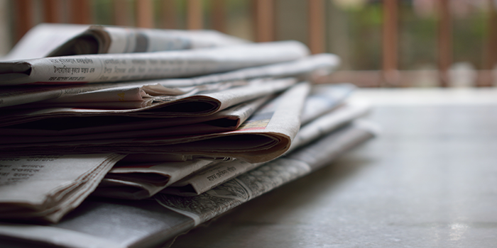 Which section of a printed newspaper do readers read most?